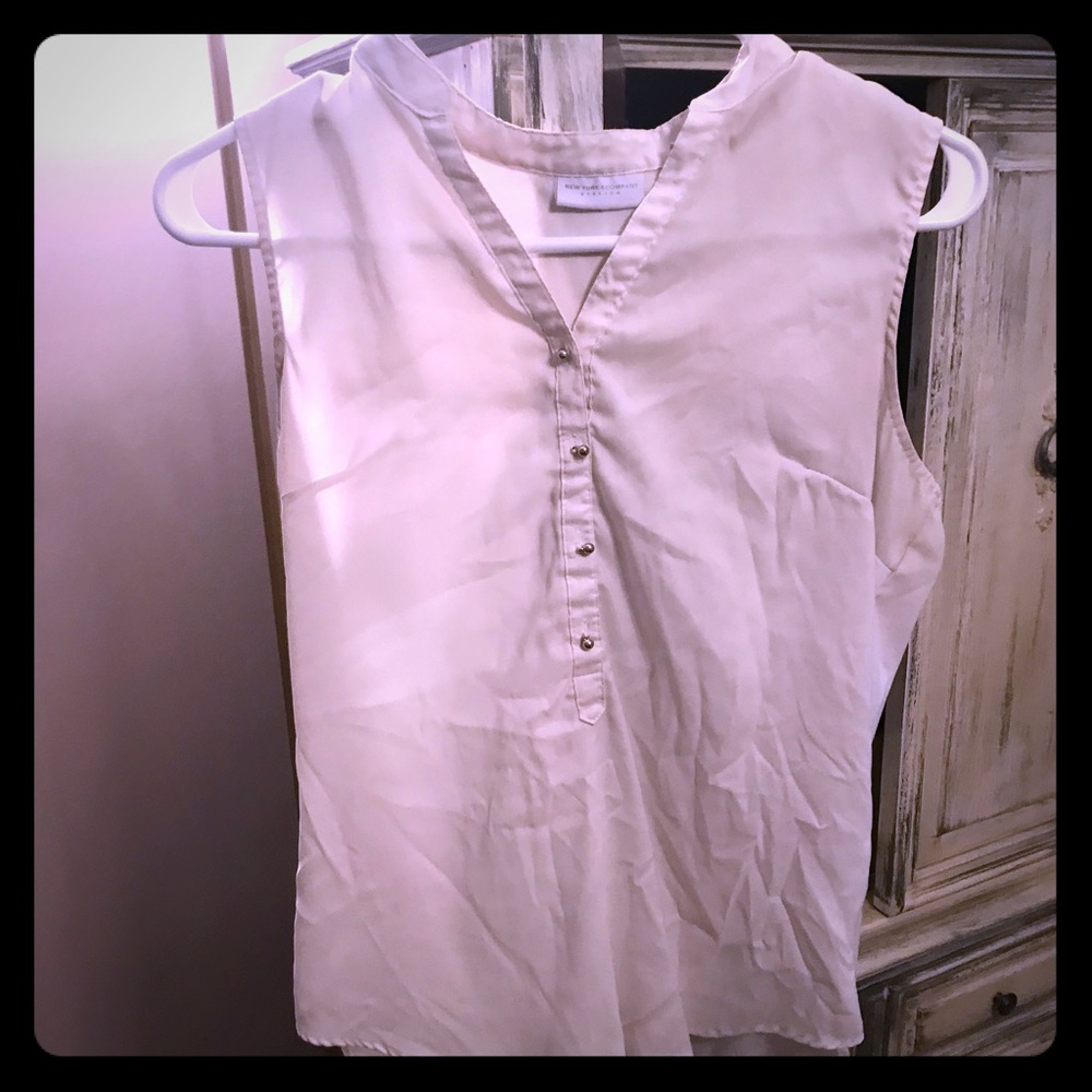 White sleeveless blouse